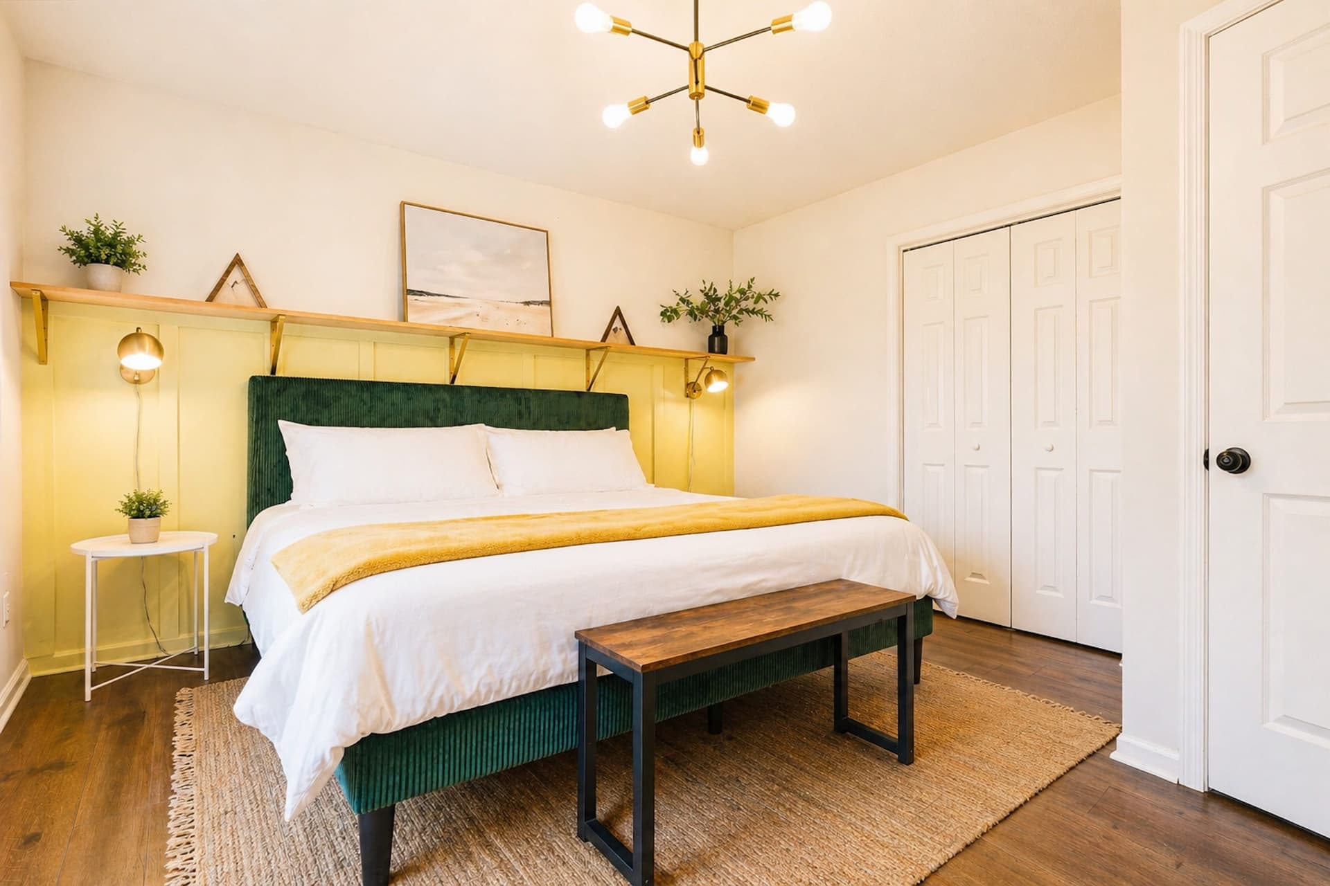 Bedroom with an upholstered bed and bench