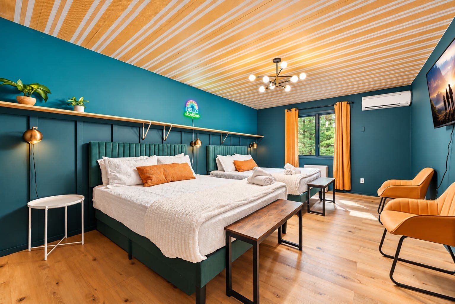 Teal bedroom with a neon sign