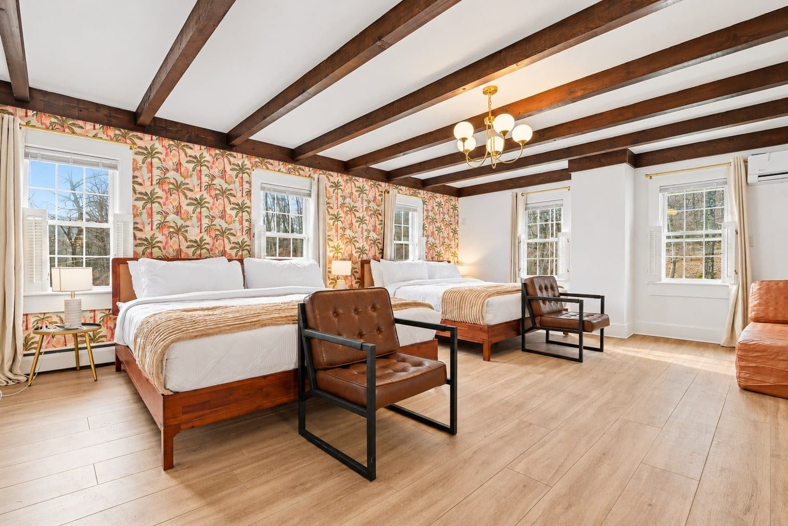 Bedroom 8 with a beamed ceiling, a king bed and a twin bed