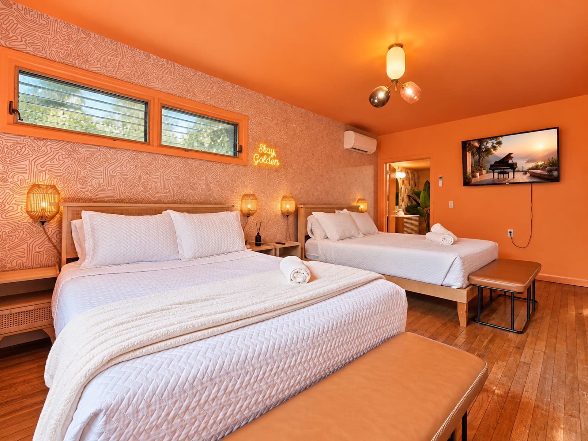 Orange bedroom with two beds