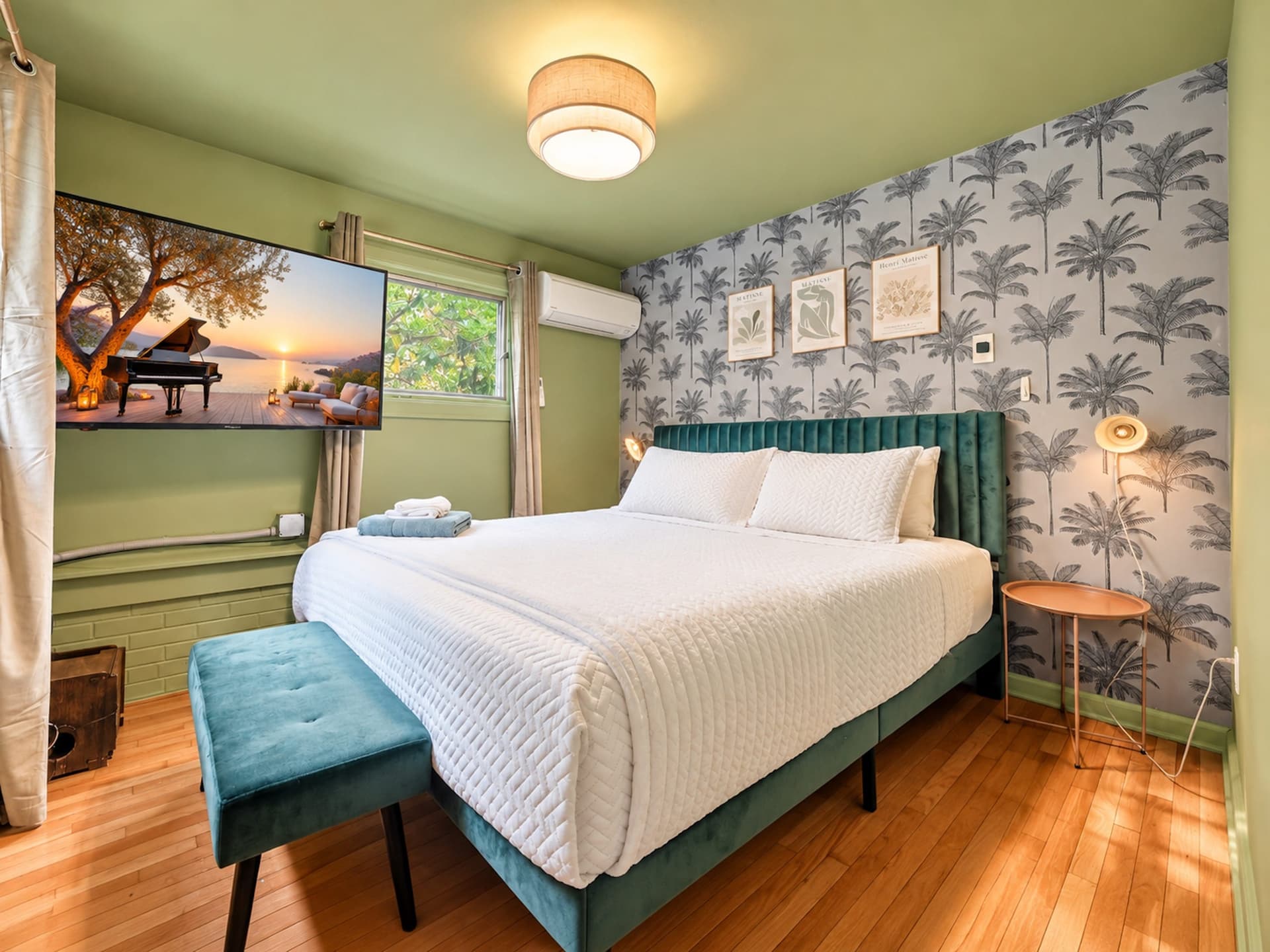Green bedroom with palm wallpaper