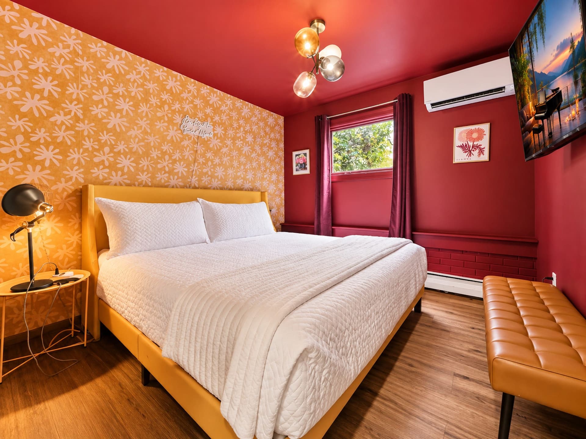 Red bedroom with an upholstered bed